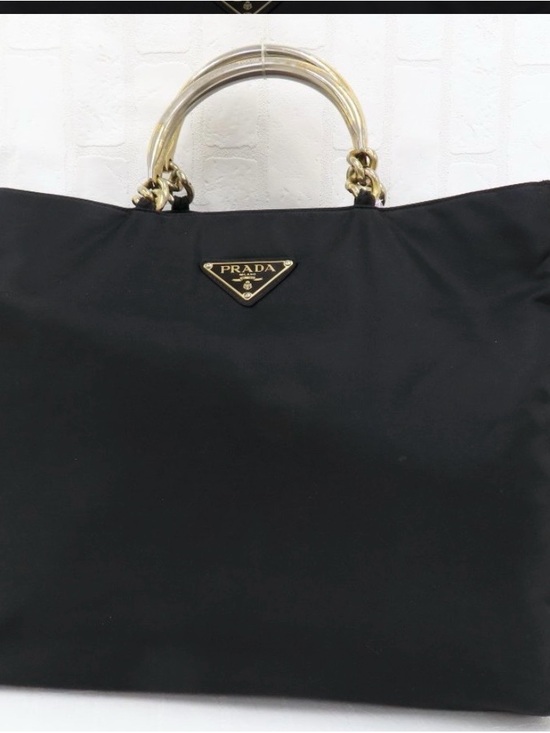 Prada Handbags - Prada Black Nylon Tote with Gold-Tone Handles
